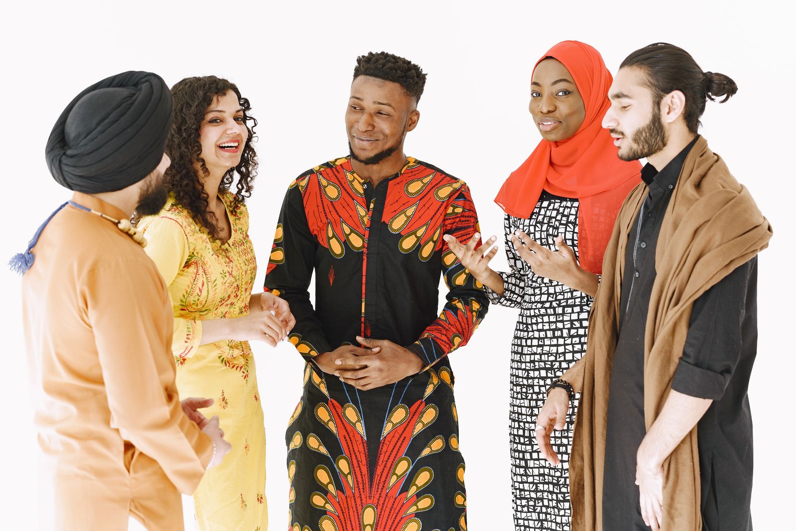 A diverse group of immigrants and refugees standing together